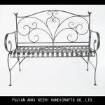 antique wrought iron garden bench with decorative birds