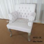 buttoned back armchair