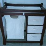 Baby changing table with hamper and three baskets