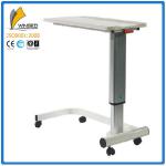 Height adjustable overbed table operated by gas spring