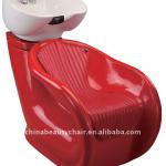 red fiber glass seated shampoo chair