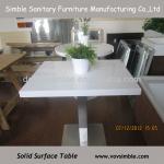white corian table/solid surface table with stainless steel table base