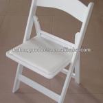 white americana resin folding chair
