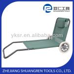 Beach lounger with wheels and sunshade