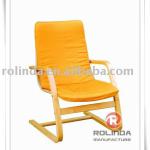 The new wooden chair with orange color cushion