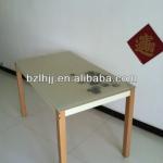 New style beige table with glass top and wooden legs(1550)