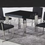 stainless legs black tempered glass dining table contemporary style