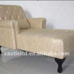 golden roll-arm chaise lounge