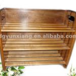 Shoe rack of solid wood