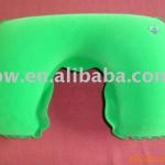 green inflatable neck pillow
