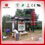 Metal bus stop shelter with advertising light box