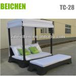 Outdoor Rattan Wicker Garden bed with white canopy