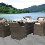 Outdoor white rattan dining table and chairs