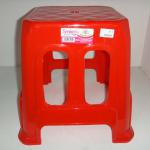 Red plastic high foot stocked stool