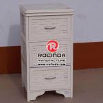 Simple painting with wooden drawer storage cabinet