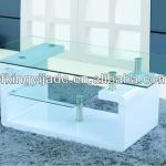 Modern glass top and stainless steel coffee table